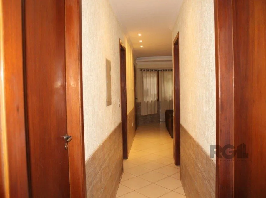Imagem Casa 179m², 3 dormitórios, 3 vagas no bairro Parque Santa Fé