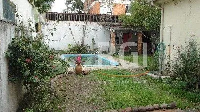 Imagem Casa para Venda - 125m², 3 dormitórios, 5 vagas - Menino Deus