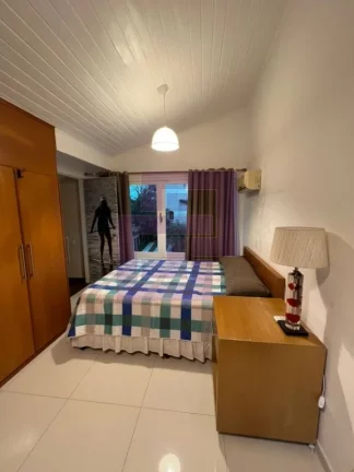 Imagem Casa à Venda no Condomínio Residencial Park Lane – 3 Suítes e Jardim com Árvores Frutíferas