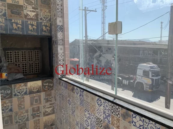 Imagem Casa sobreposta alta à venda com 72m², 2 quartos, 1 suíte, churrasqueira por R$315.000,00 em Santos