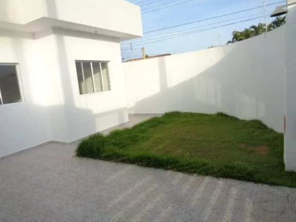 Imagem Casa Geminada 71 m 2 doms/1 Suíte 2 vagas próximo a praia