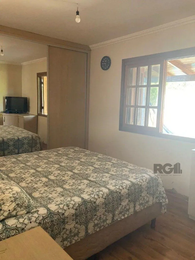 Imagem Casa com 3 dormitórios no bairro Lomba do Pinheiro
