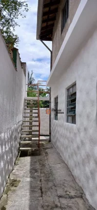 Imagem Sobrado com 4 dormitórios à venda, 180 m² por R$ 480.000,00 - Massaguaçu - Caraguatatuba/SP