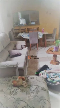 Imagem Casa com 3 dormitórios à venda, 135 m² por R$ 600.000 - Maracanã - Praia Grande/SP