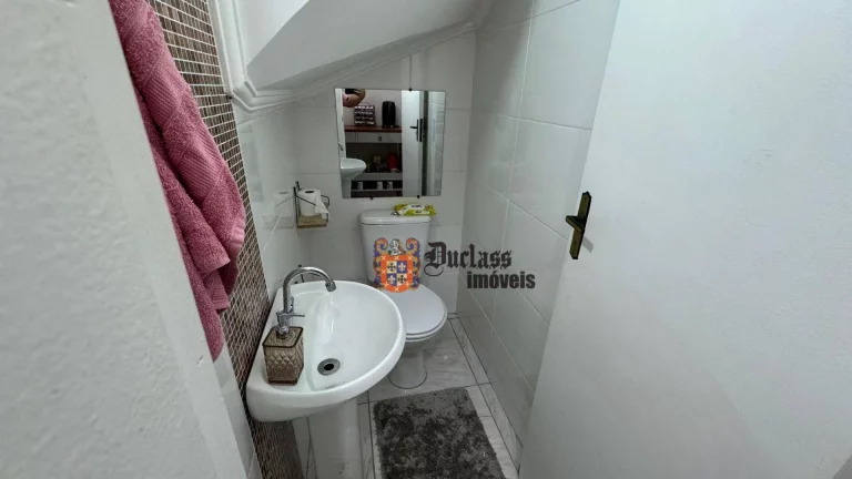 Imagem Sobrado com 2 dormitórios à venda, 62 m² por R$ 430.000,00 - Vila Guilhermina - Praia Grande/SP