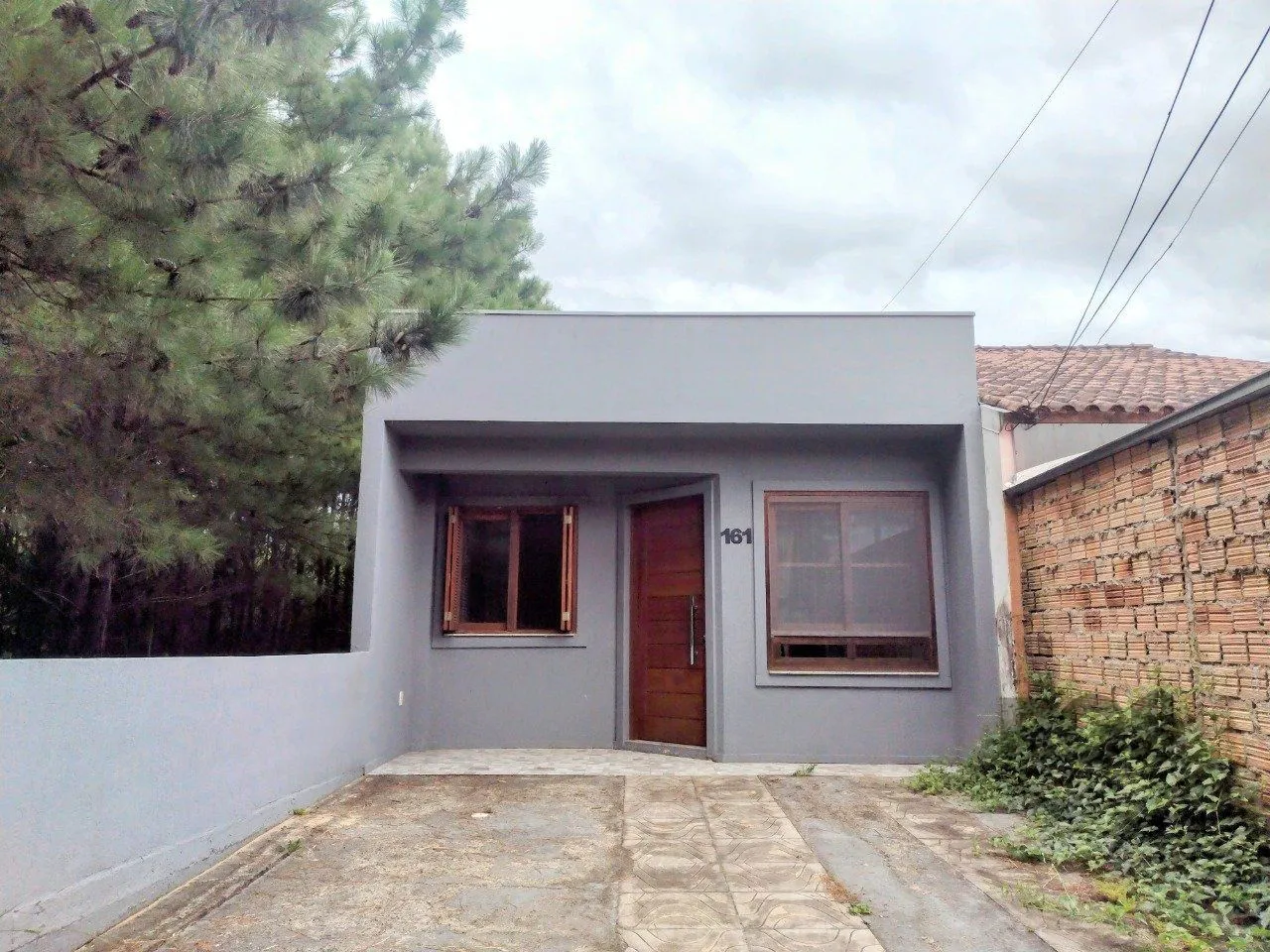 Imagem CASA TÉRREA - 2 DORMITÓRIOS, ÁREA COBERTA COM CHURRASQUEIRA , TERRAÇO - 02 VAGAS