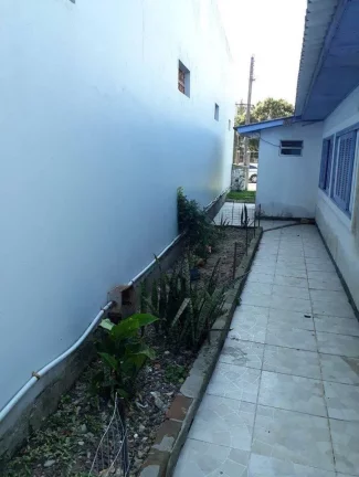 Imagem Casa com 3 quartos, 384m², à venda em Torres, centro