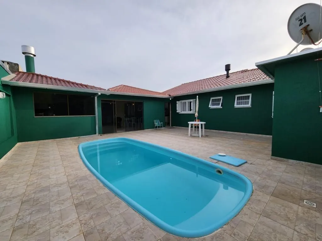 Imagem Casa 3 dormitórios, 1 suite, lareira, 2 vagas de garagem, piscina, bairro Mariápolis, Osório-RS