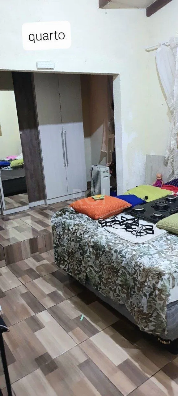 Imagem Casa 2 dormitórios, 1 suíte, vaga de garagem, Bairro Nova Cachoeirinha