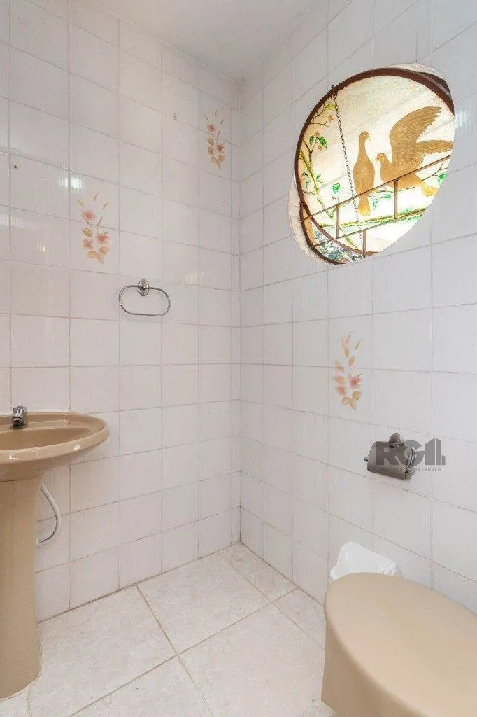 Imagem Casa de 4 dormitórios no bairro Camaquã