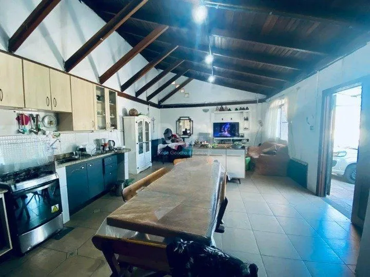 Imagem CASA BAIRRO CAMAQUÃ COM 4 DORMITORIOS