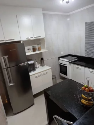 Imagem Sobrado com 2 dormitórios à venda, 107 m² por R$ 580.000,00 - Vila Cecília Maria - Santo André/SP