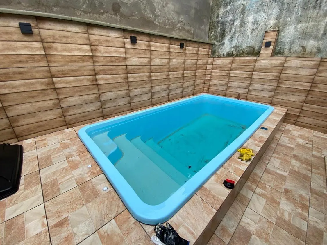 Imagem CASA NOVA COM PISCINA E ACEITA FINANCIAMENTO BANCÁRIO NO JARDIM JAMAICA EM ITANHAÉM