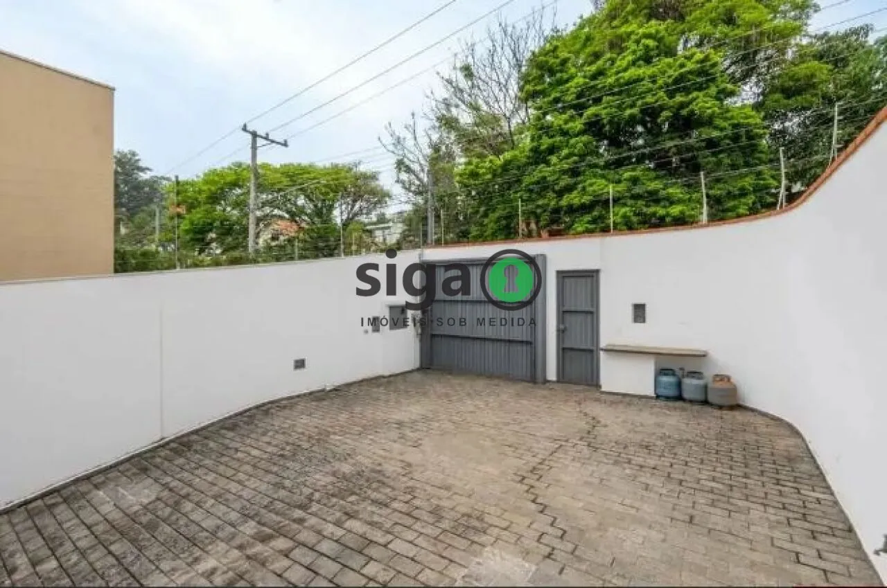 Imagem Casa Alto Padrão no Real Parque de 4 Quartos com 8 Vagas - 450m² à Venda.