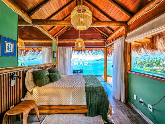 Imagem Casa de Luxo à Beira Mar em Angra dos Reis: 6 Suítes, 7 Salas, 950m² - Piscina, Churrasqueira e Deck Privativo