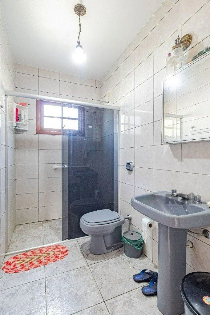 Imagem Casa com 267m², 3 dormitórios, 1 vaga no bairro Tristeza