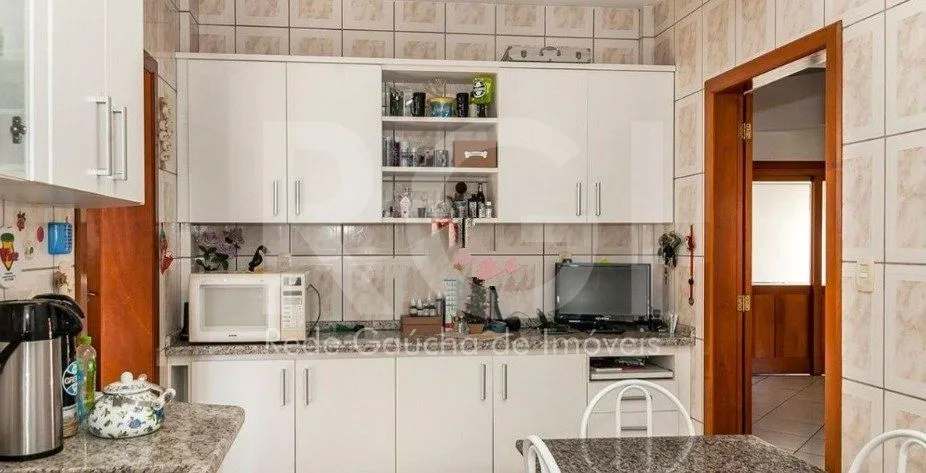 Imagem Casa para Venda - 287m², 4 dormitórios, sendo 1 suites, 4 vagas - Partenon