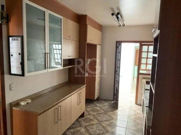 Imagem Casa no bairro Jardim Botânico de 3 dormitórios
