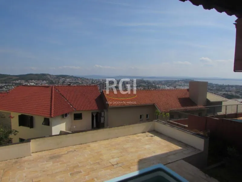 Imagem Casa Condominio para Venda - 383.4m², 5 dormitórios, sendo 2 suites, 3 vagas - Nonoai