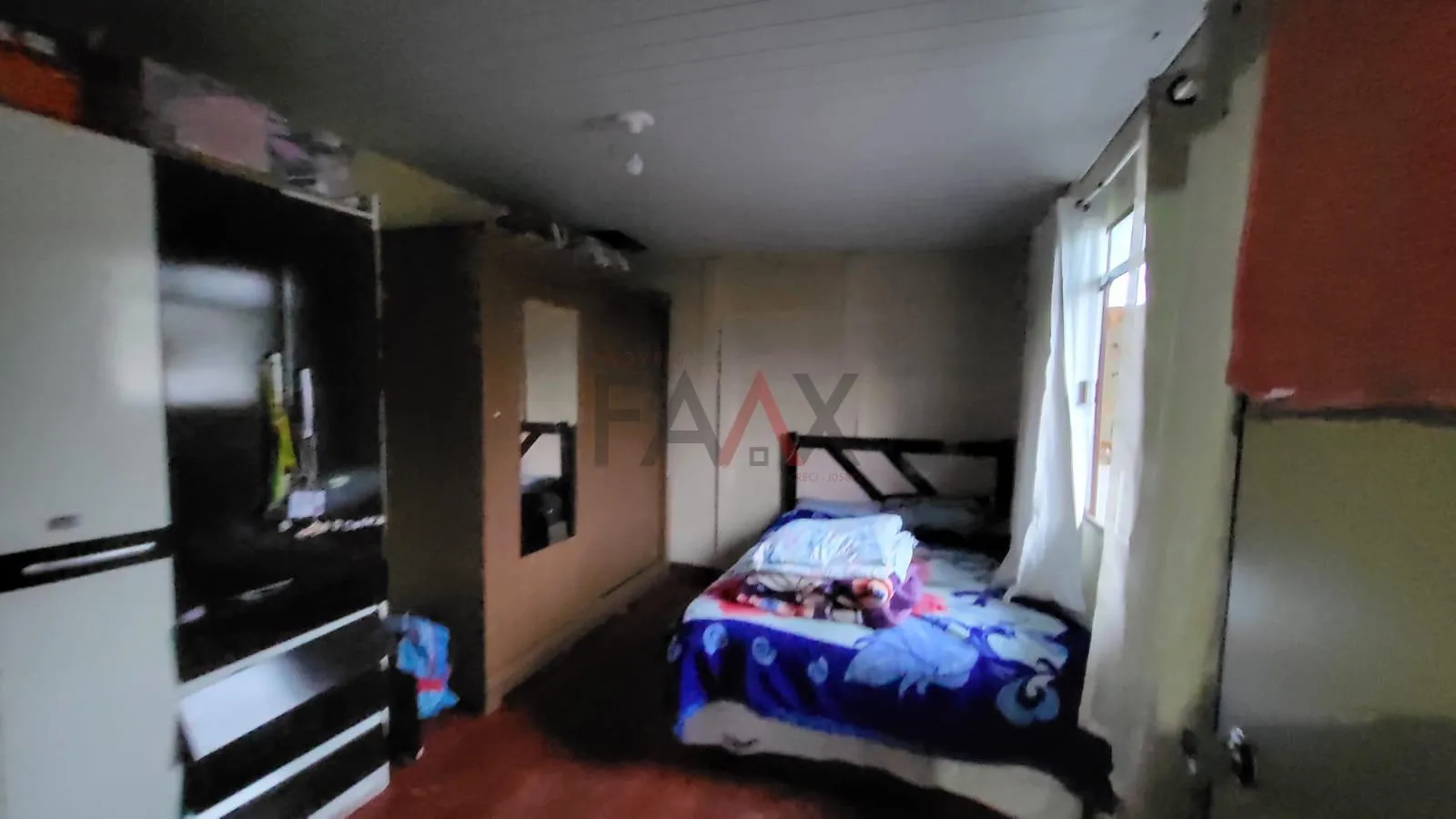 Imagem Terreno à venda com Duas casas - Ideal para Morar e Investir