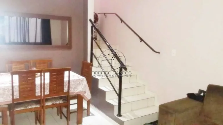 Imagem Casa Geminada à Venda em Tude Bastos, Praia Grande - 2 Quartos e Churrasqueira