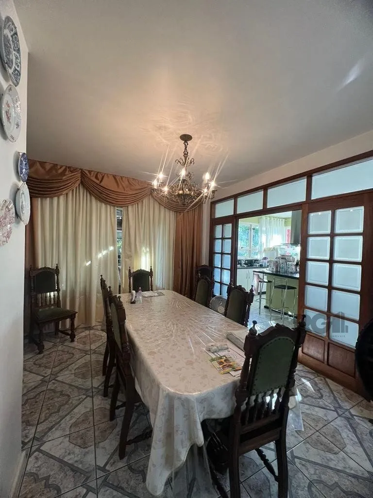 Imagem Casa com 4 quartos, suíte, churrasqueira, vaga de garagem, no bairro Elsa, Viamão/RS