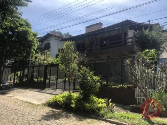 Foto do imóvel Casa com 6 dormitórios, 918 m² - venda por R$ 5.200.000,00 ou aluguel por R$ 51.300,00/mês - Ipanema - Porto Alegre/RS