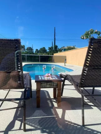 Imagem Casa Aconchegante e Mobiliada com Piscina e Área Gourmet em Ibiraquera - Imbituba/SC