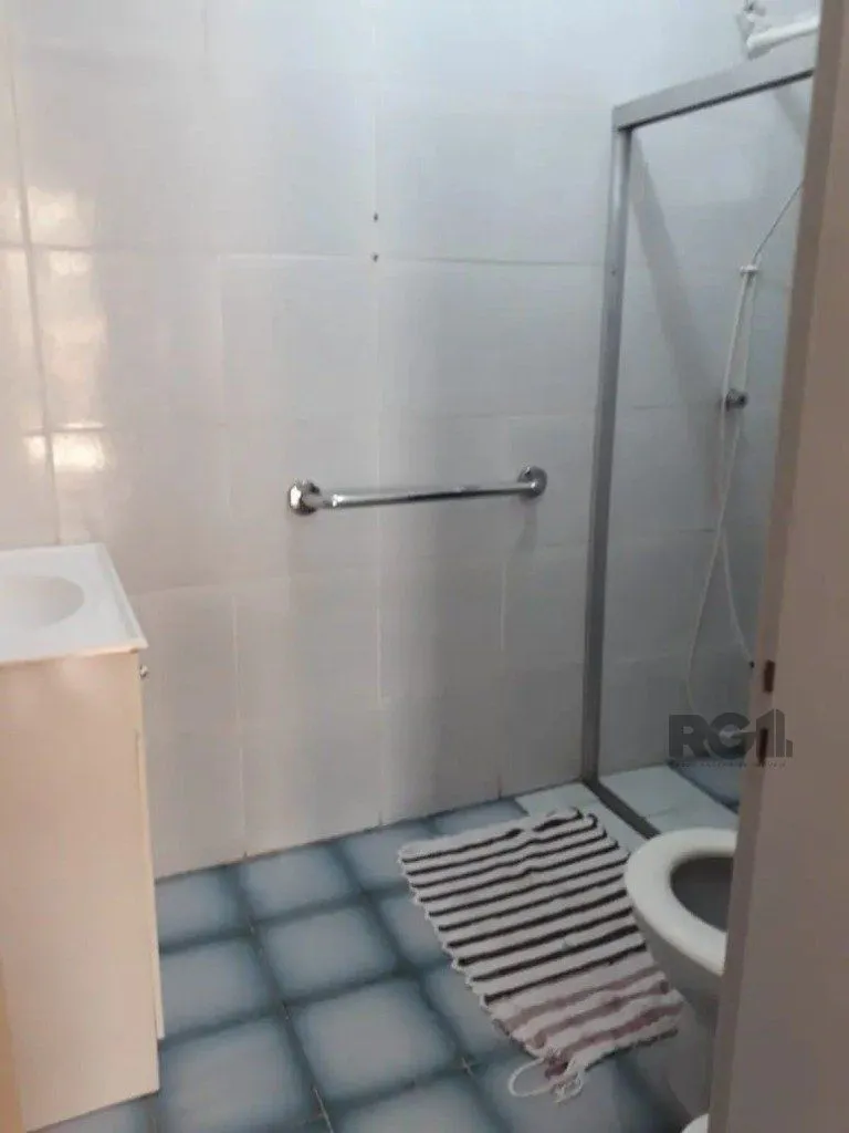Imagem Casa com 5 dormitórios no bairro Passo das Pedras - Porto Alegre