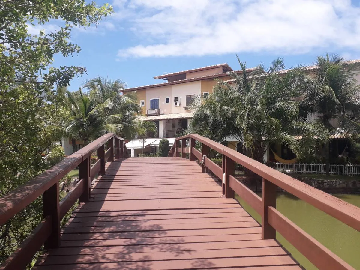 Imagem Village 3 Quartos Nascente com Vista Verde à Beira do Rio Joanes - Lazer Completo!"