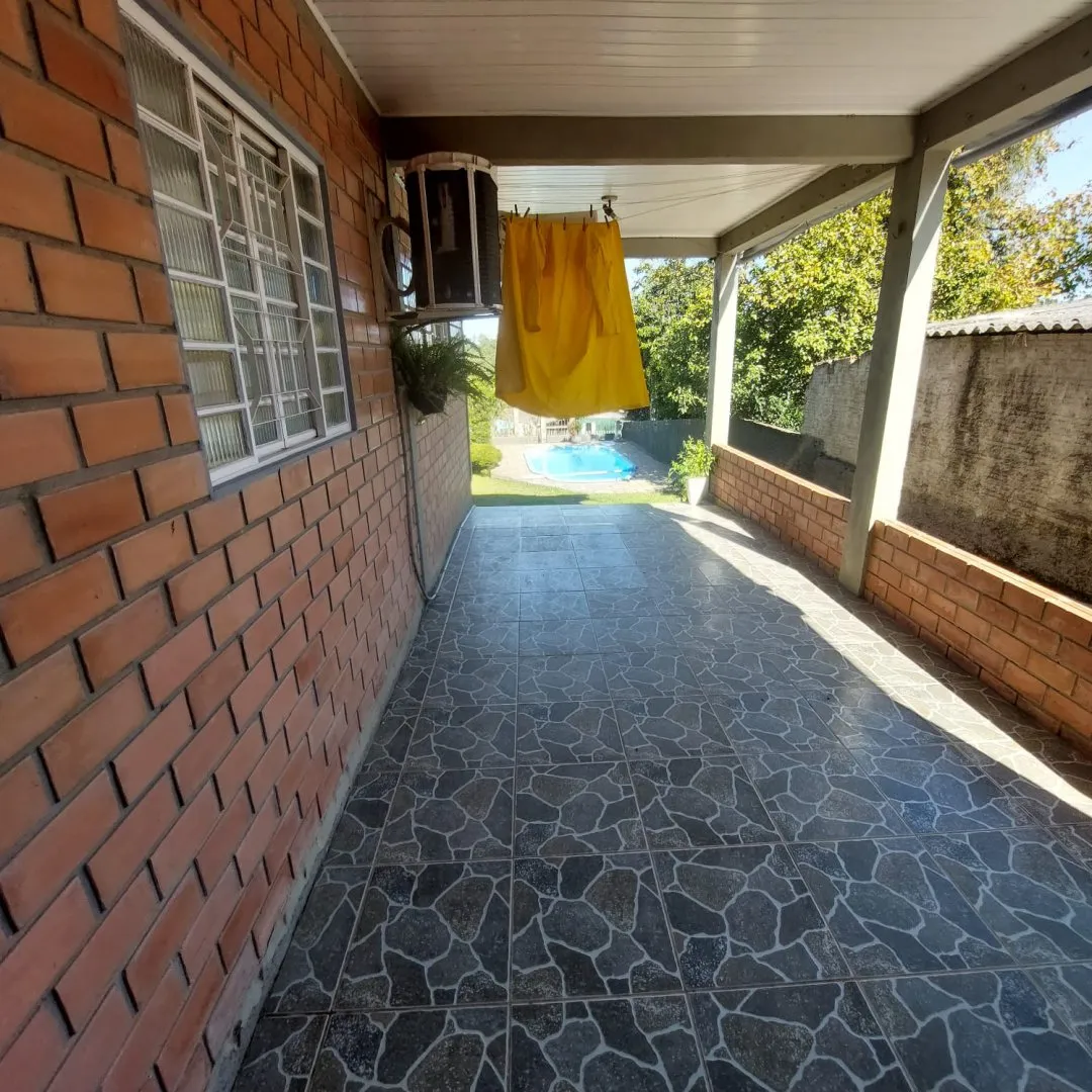 Imagem Casa com Piscina à Venda em Santo Onofre, Viamão