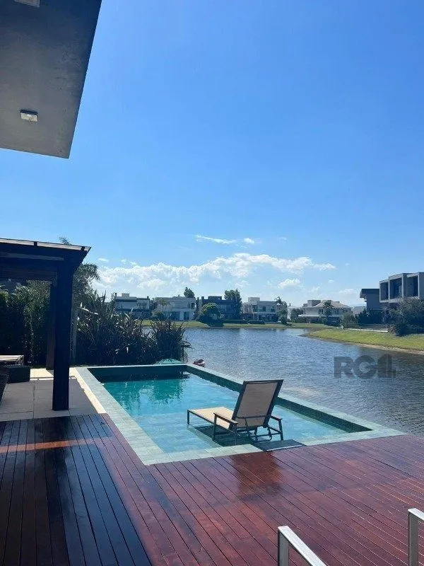 Imagem Casa de Condomínio em Atlântida Sul