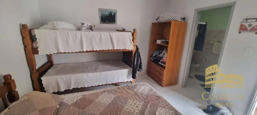 Imagem Casa com 4 dormitórios à venda por R$ 643.000,00 - Solemar - Praia Grande/SP