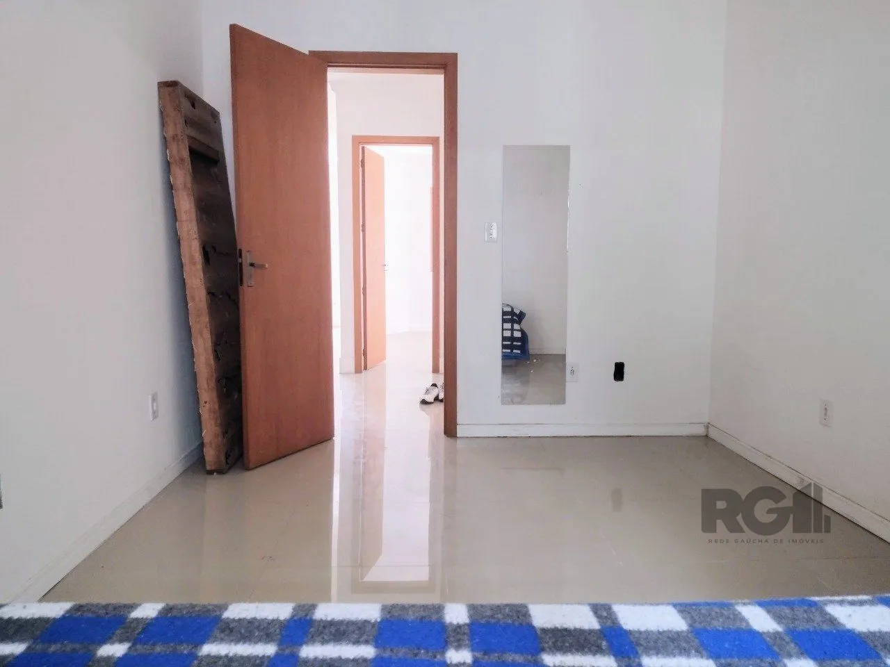 Imagem CASA TÉRREA - 2 DORMITÓRIOS, ÁREA COBERTA COM CHURRASQUEIRA , TERRAÇO - 02 VAGAS