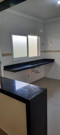 Imagem Casa com 2 dormitórios à venda, 110 m² por R$ 585.000,00 - Maracanã - Praia Grande/SP