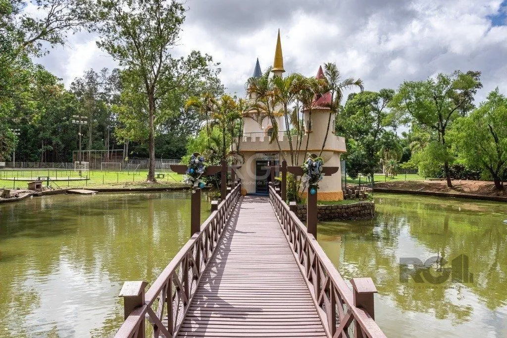 Imagem Casa com 4 quartos, suíte, churrasqueira, vaga de garagem, no bairro Elsa, Viamão/RS