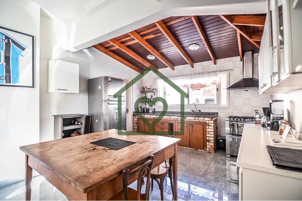 Imagem Esta casa ampla de 150m² está muito bem distribuída e oferece três dormitórios confortáveis. A...