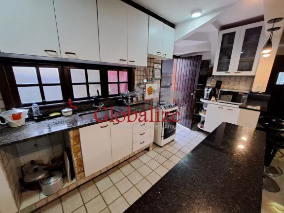 Imagem Sobrado à venda com 118m², 3 quartos, 2 suítes, 2 vagas, churrasqueira por R$1015.000,00 no Boqueirão em Santos