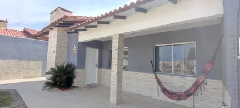 A sua casa pé na Areia