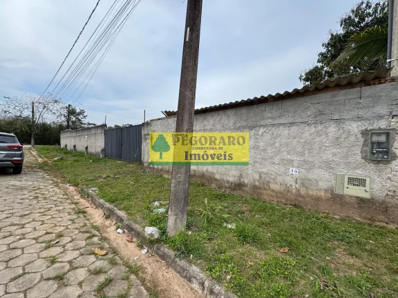 Imagem Terreno de Esquina no Getuba - 1.118 m²: Plano, Murado, Pavimentado, Água e Luz Instalados