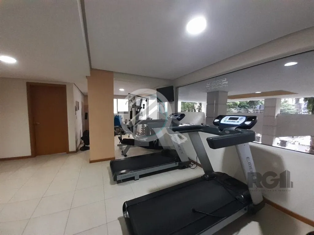Imagem Apartamento de dois dormitórios sendo um suíte, living dois ambientes com churrasqueira, cozinha e...