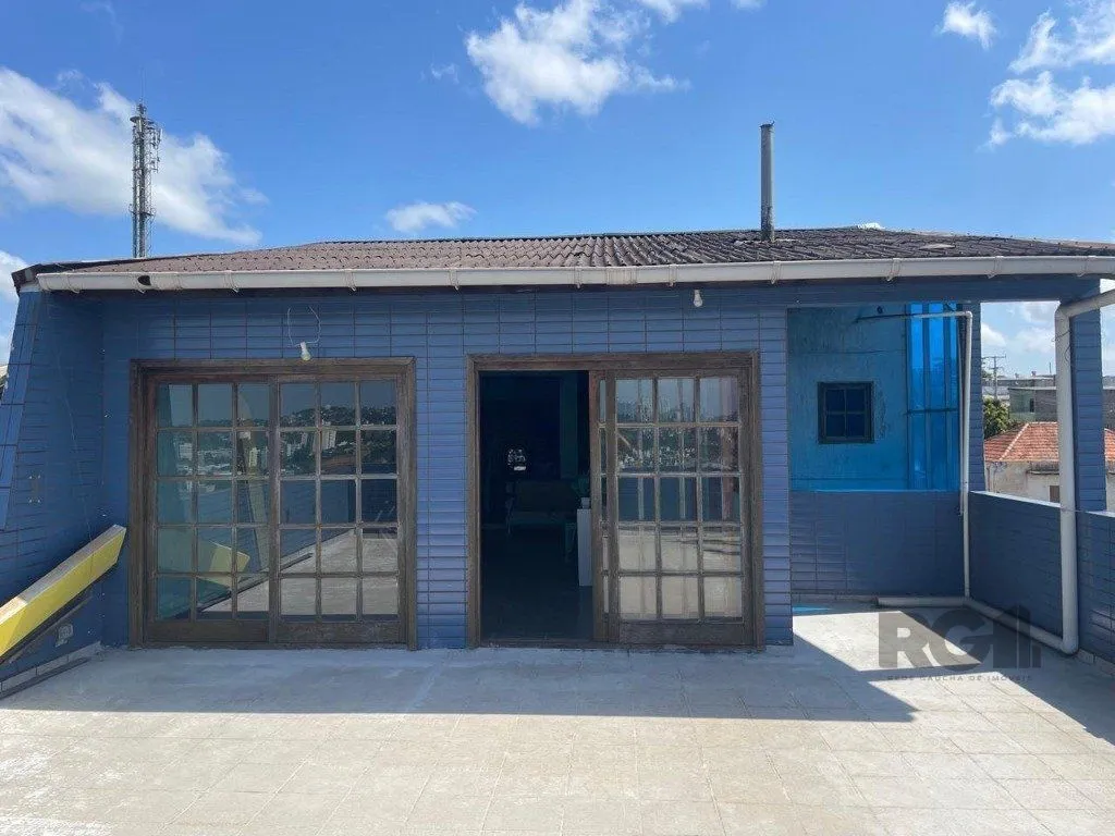 Imagem Casa 420m², 4 dormitórios, 3 vagas no bairro Partenon