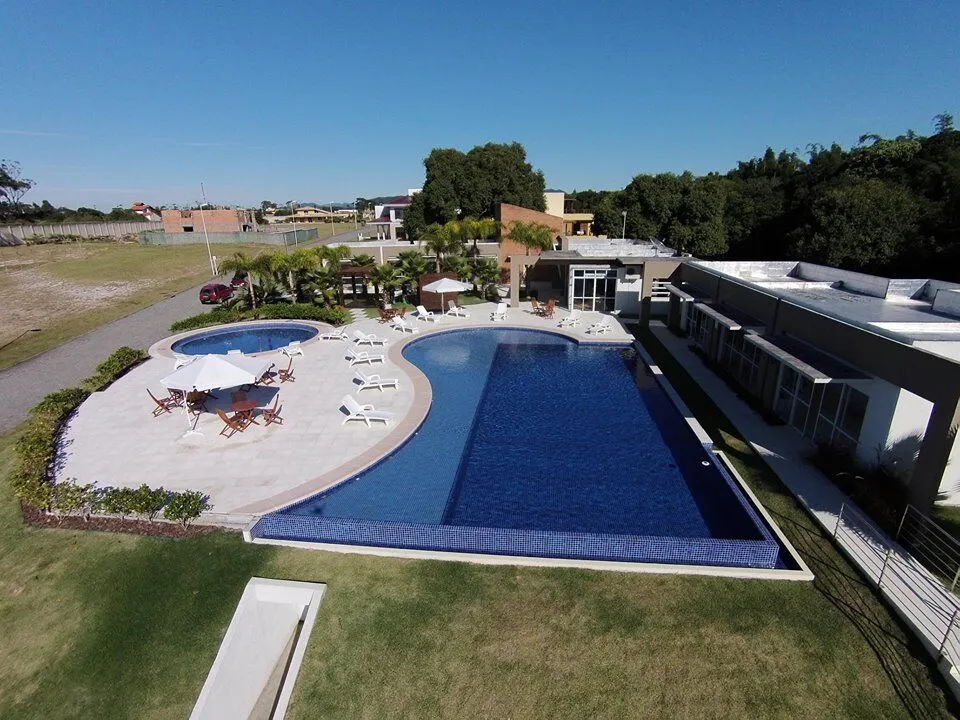 Imagem Terreno em Araçatuba, Imbituba - Condomínio com piscina, quadra poliesportiva e sauna