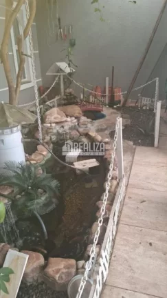 Imagem Casa de 3 quartos com piscina aquecida e energia fotovoltaica no Condomínio Vanice Andrade, no bairro Vila Arquelau.