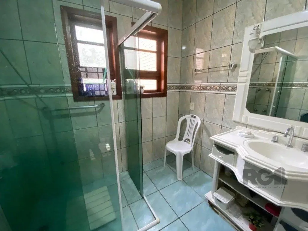 Imagem Casa com 4 dormitórios no bairro nonoai