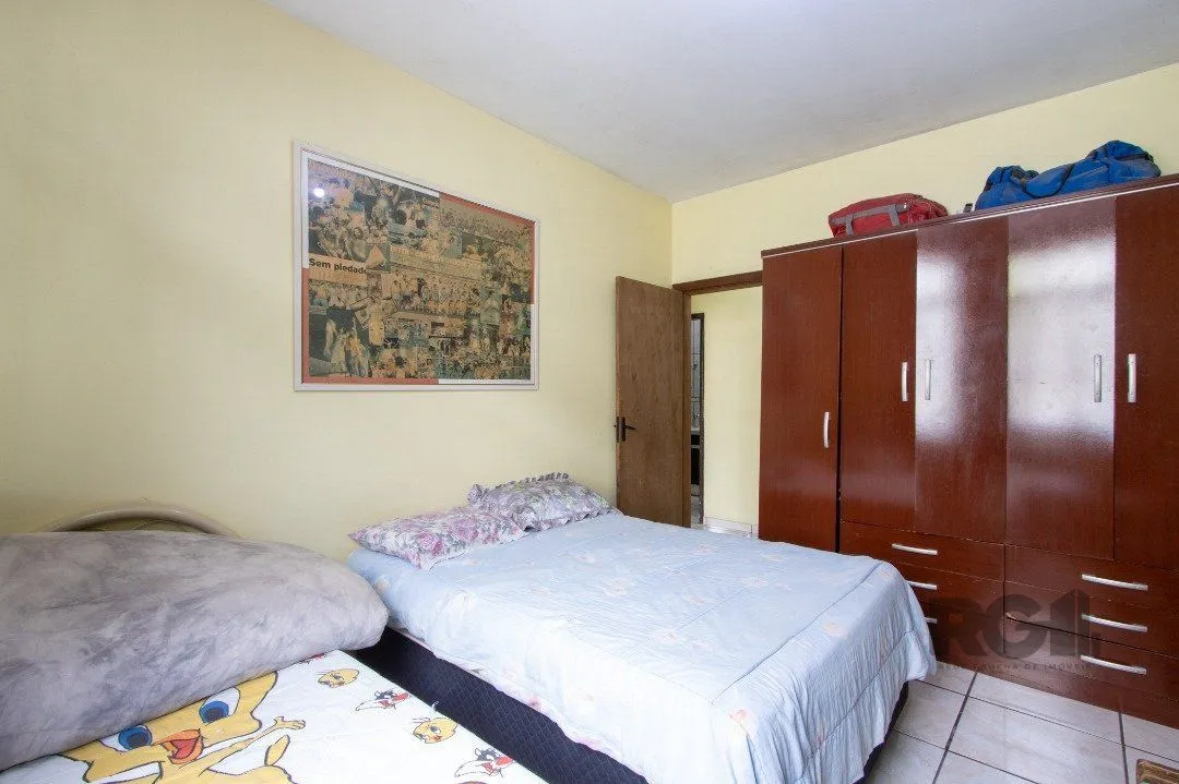 Imagem Casa térrea, 3 quartos, 2 banheiros, com pátio no Bairro Cavalhada