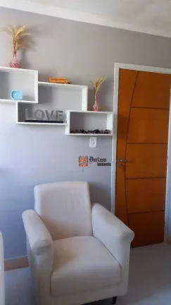 Imagem Apartamento com 2 dormitórios à venda, 56 m² por R$ 360.000 - Caiçara - Praia Grande/SP
