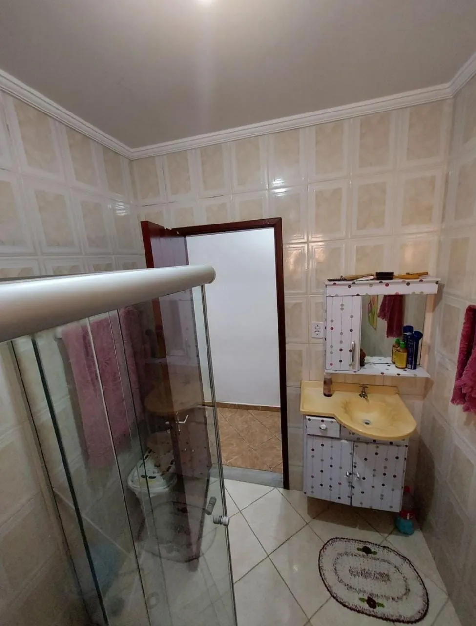 Imagem Sobrado Imponente com 4 Dormitórios, 2 Suítes, Cozinha Externa, Sacada e Ótima Estrutura à Venda - Grande Oportunidade!