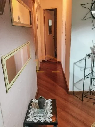Imagem Apartamento com 2 dormitórios e 60 m² de área útil. Sala dois ambientes, cozinha com armários, ...