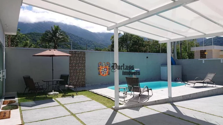 Imagem Casa com 3 dormitórios à venda, 107 m² por R$ 890.000,00 - Massaguaçu - Caraguatatuba/SP